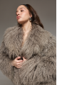 Women's gray fur coat made of natural llama